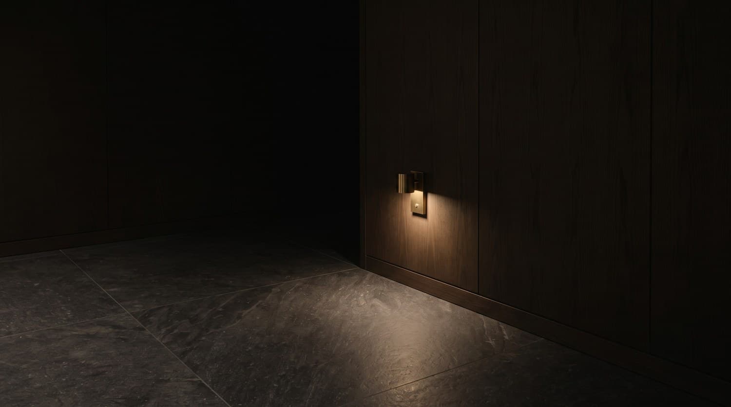 Concept still: a wall sconce against dark oak panelling